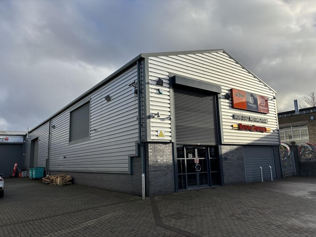Side view of the warehouse and its forecourt