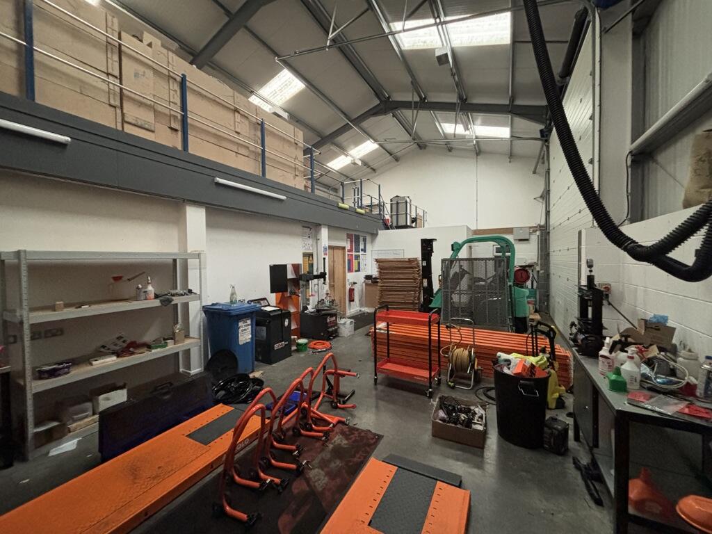 Warehouse interior with high roof and mezzanine