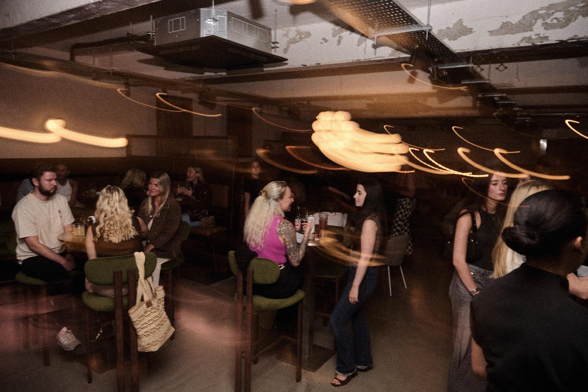 Guests enjoying drinks and conversation at The Uncommon in North Shields